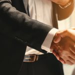 business background of businessman having handshake